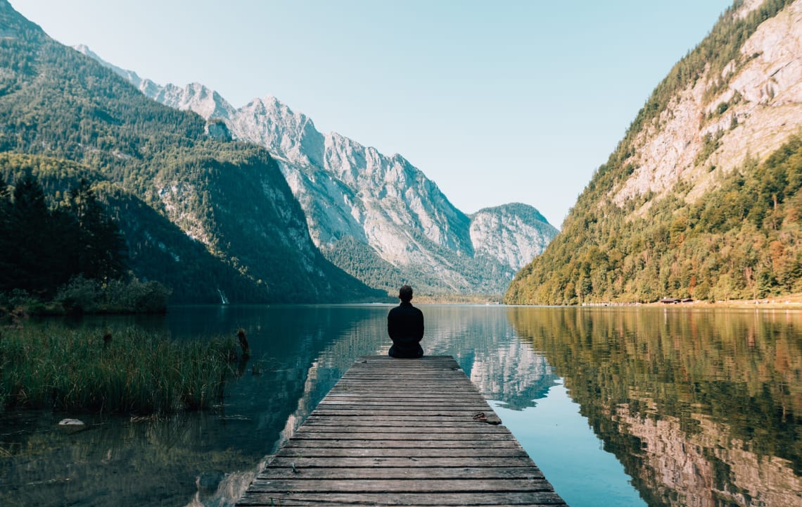 Traveler taking a quiet moment in nature