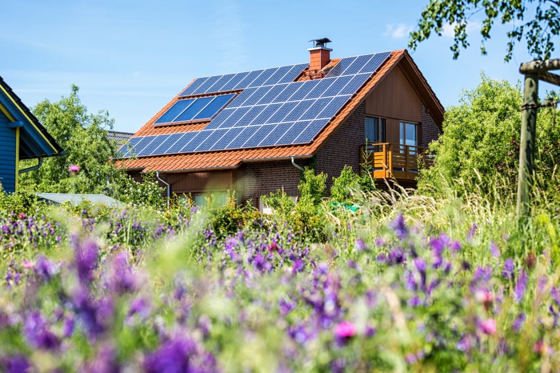 Sustainable living: house with solar panels