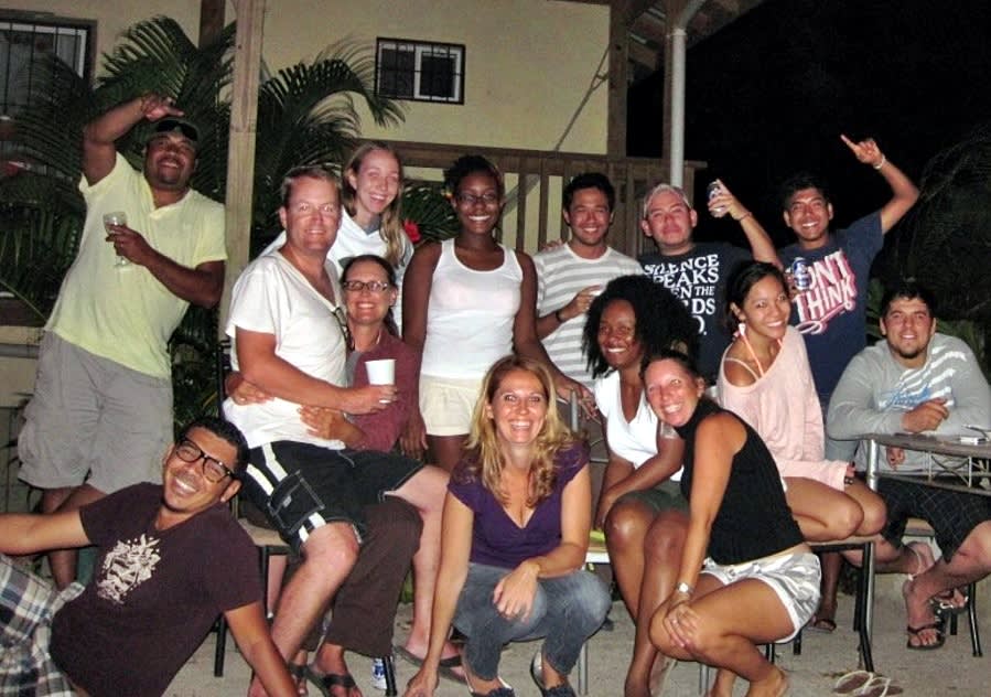 Group of happy volunteers in a hostel in Honduras