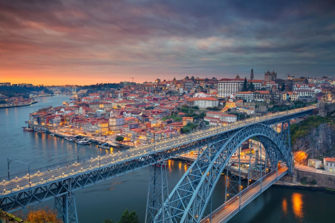 View of Porto with the iconic steel bridge at the front