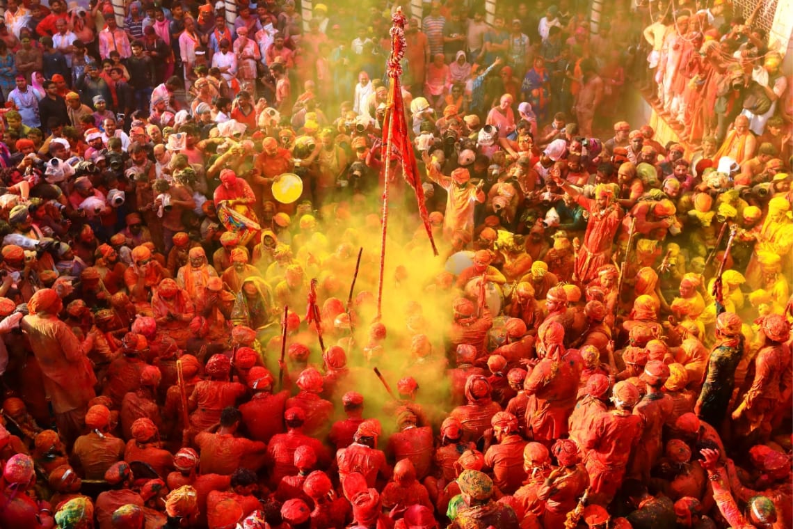 Crowd celebrating Holi in India, one of the top 10 best experiences around the world