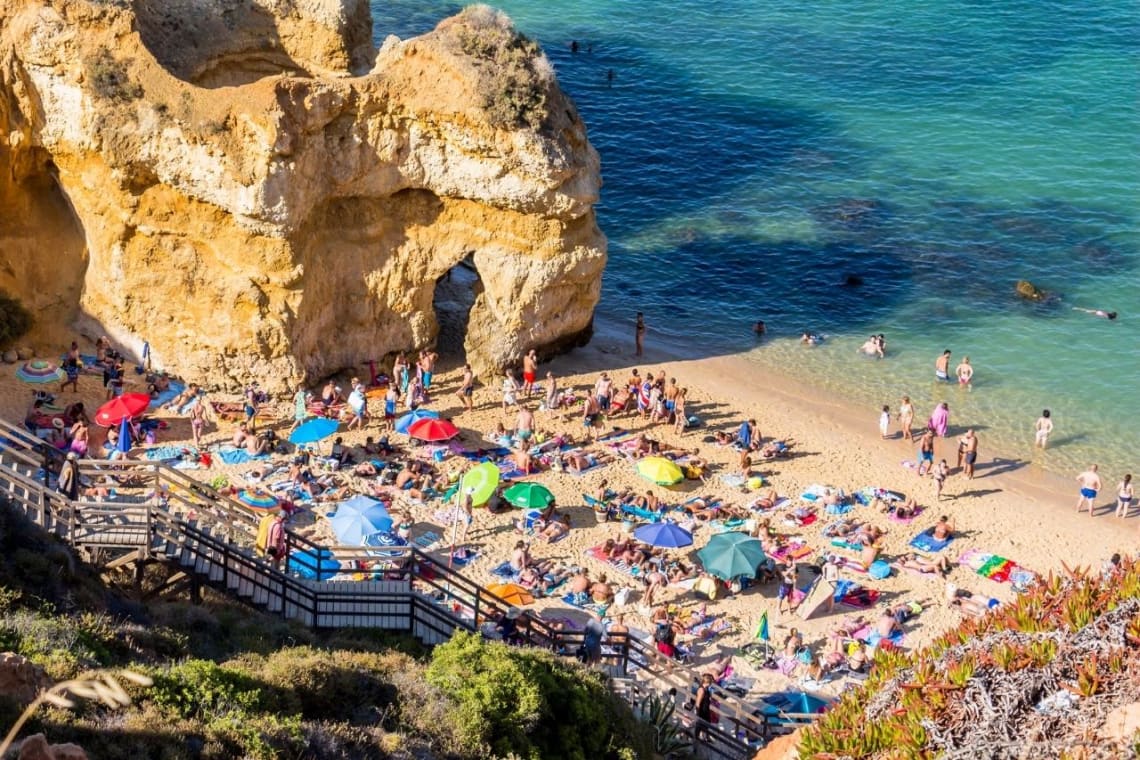 Small beach full of tourists