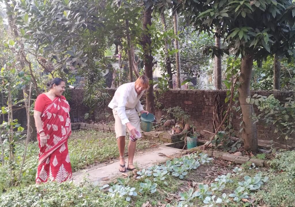 a young traveler volunteering in a homestay in India