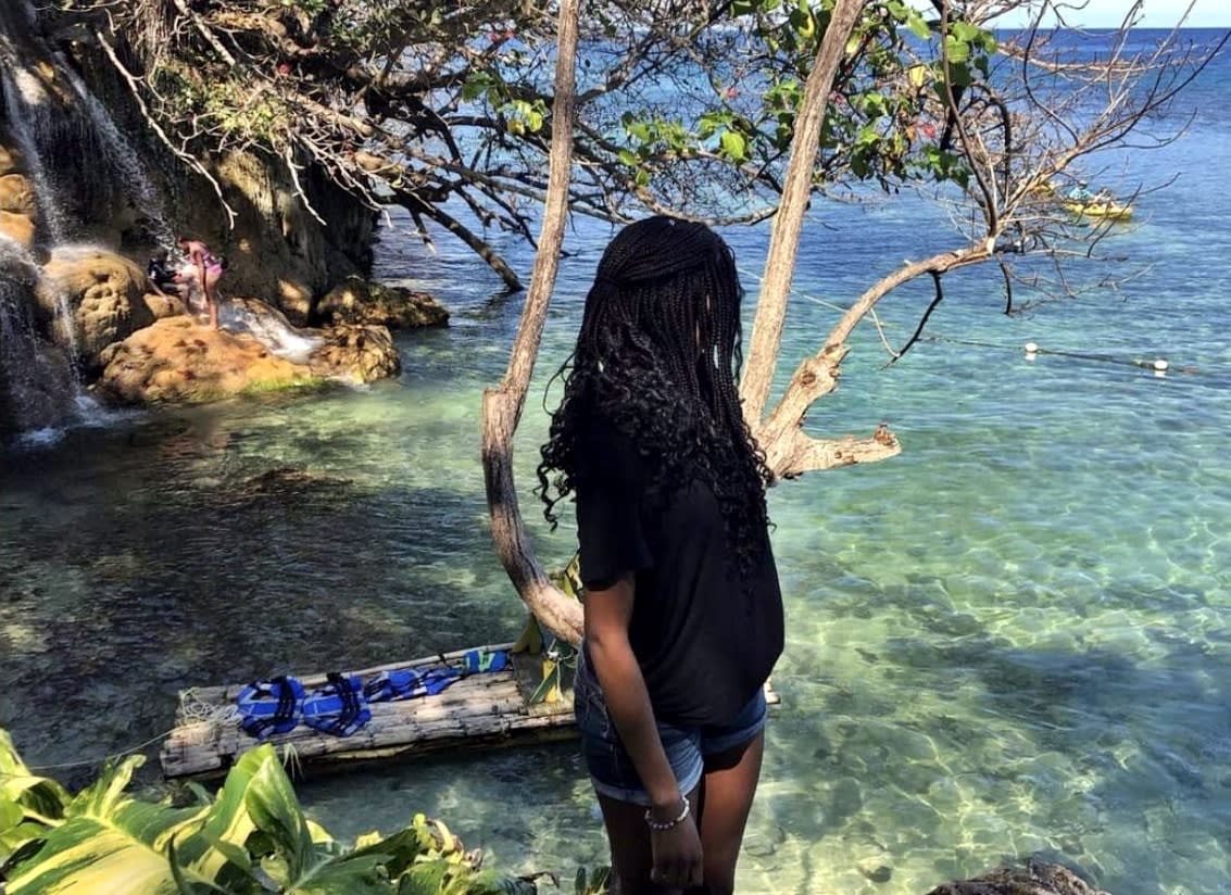 Girl looking at the sea in Jamaica