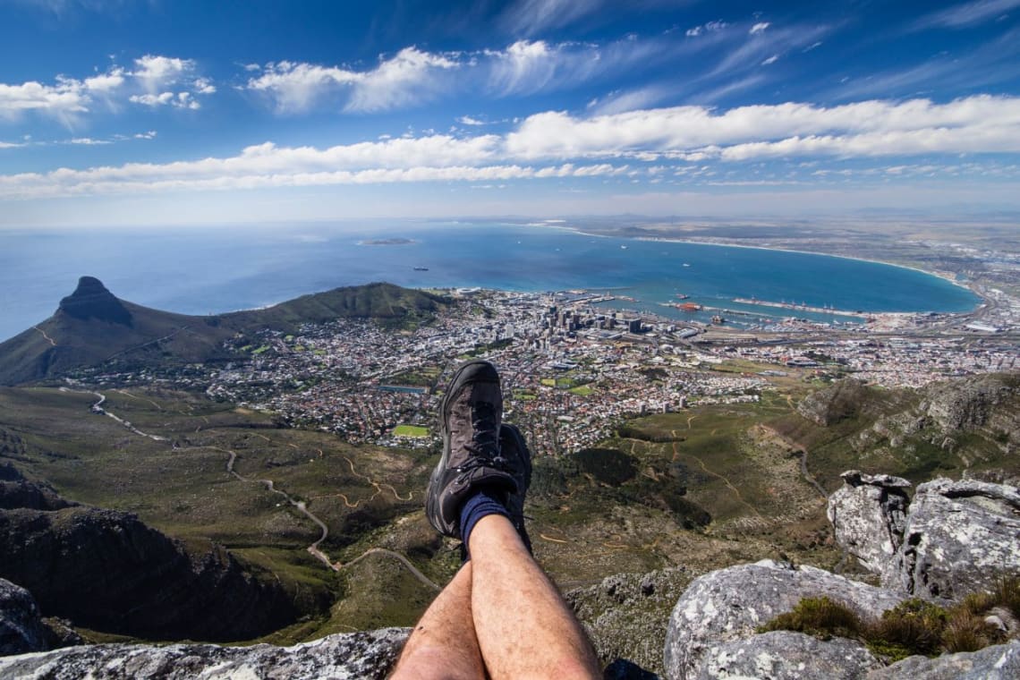 Things to do in Cape Town: man enjoying the view from Table Mountain