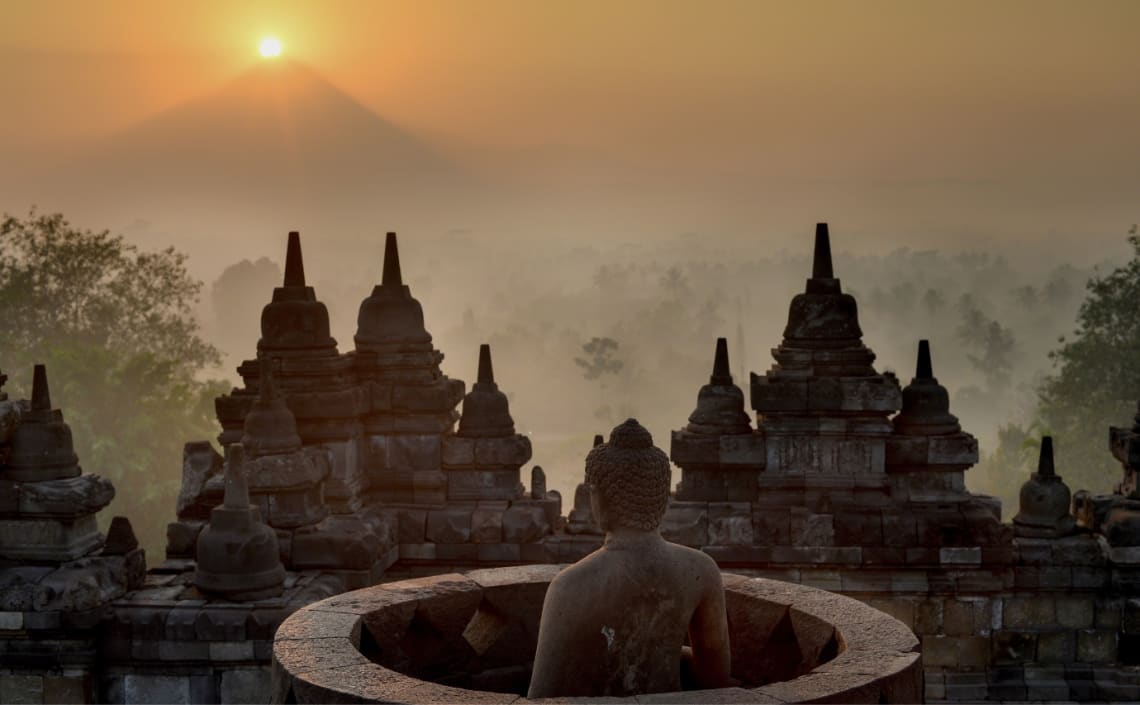 Sunset at Borobudur temple. Visiting this complex is one of the best things to do in Indonesia