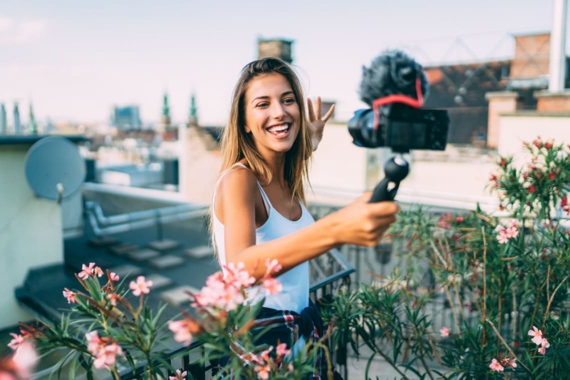 Travel influencer filming herself