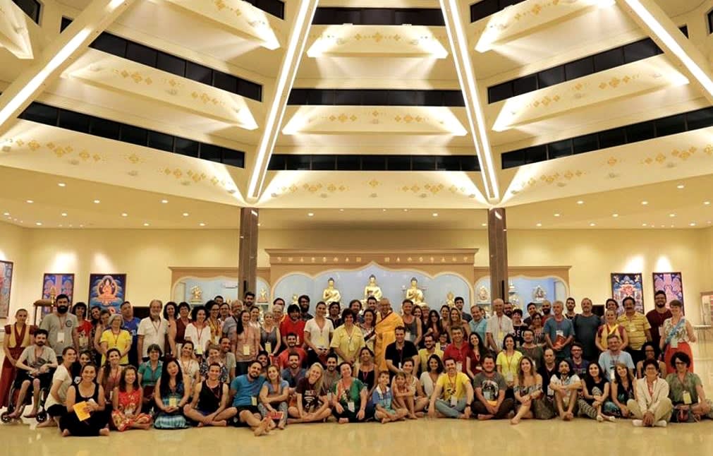 Big group of people posing for the photo at a spiritual retreat