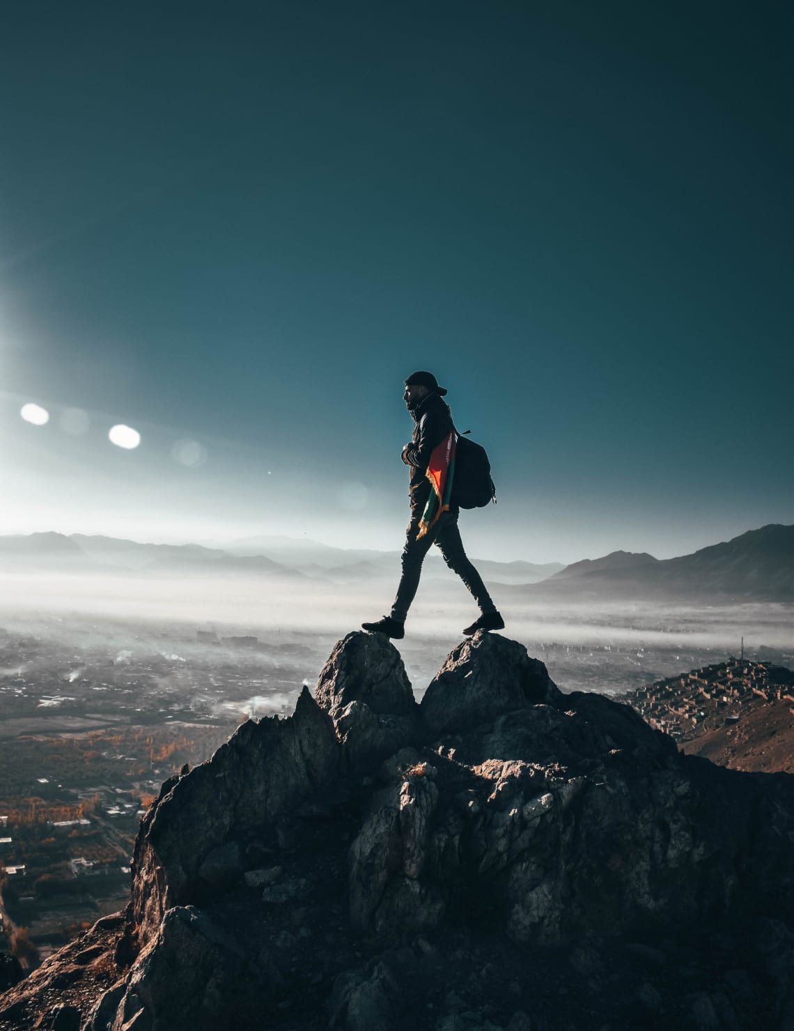 Solo adventurer on a mountaintop