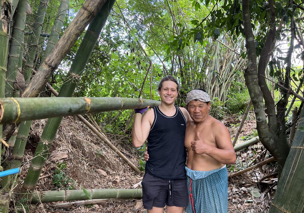 Volunteer engaging in farm work in Thailand