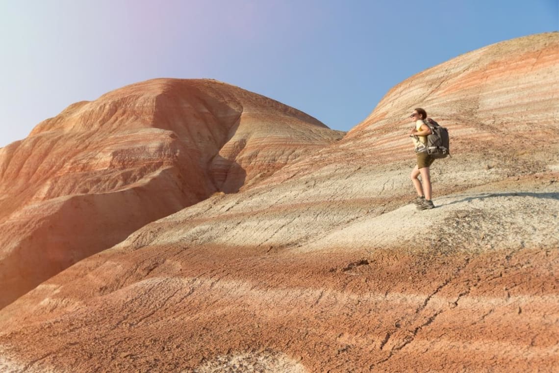 Girl hiking in red rocks