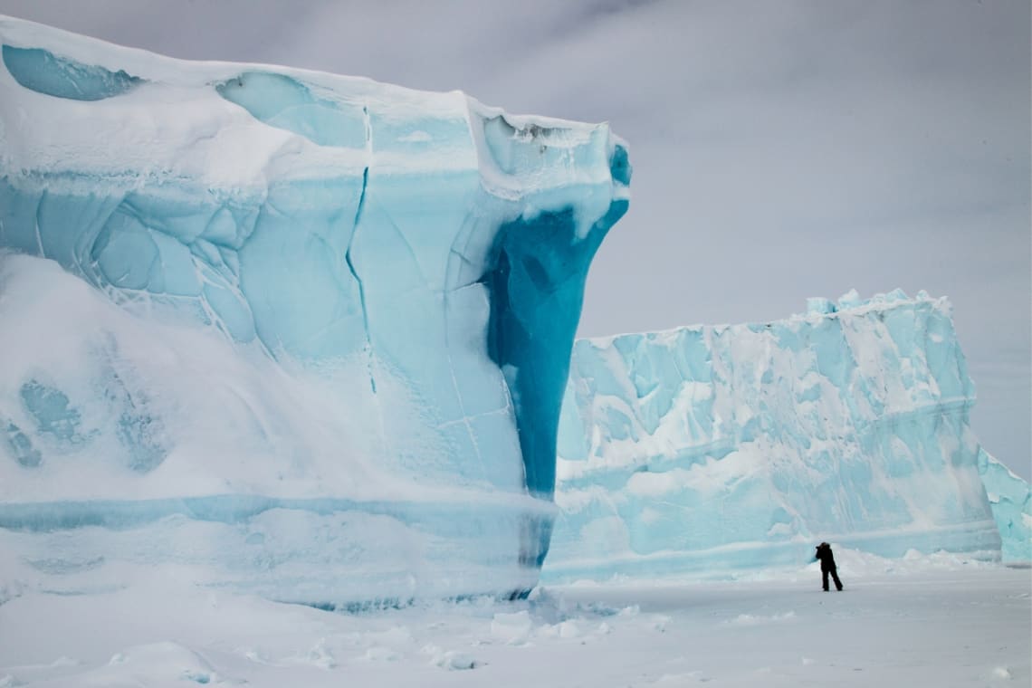 A person exploring ice fields in Northern Canada