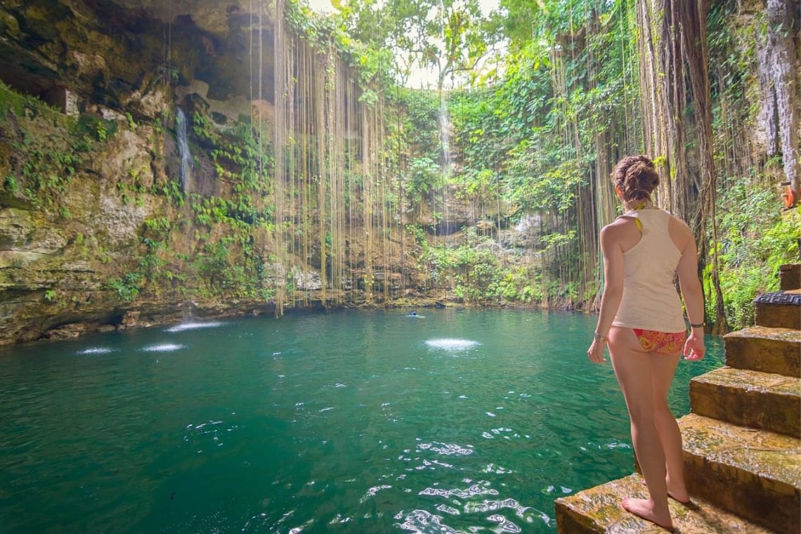 Girl about to swim in a cenote in Yucatan Peninsula