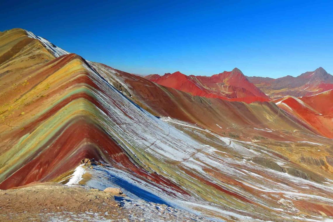 Lugares baratos para viajar en Perú - Worldpackers - vinicunca