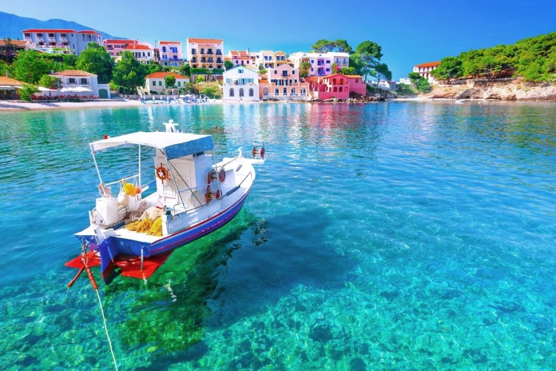 Small boat in the turquoise water of Assos, Kefalonia