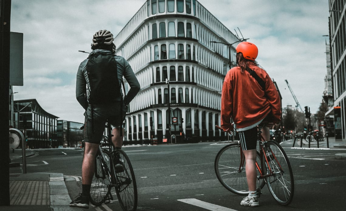 two bikers exploring a new city together