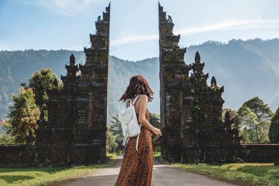 A traveller at the Handara gate, Bali
