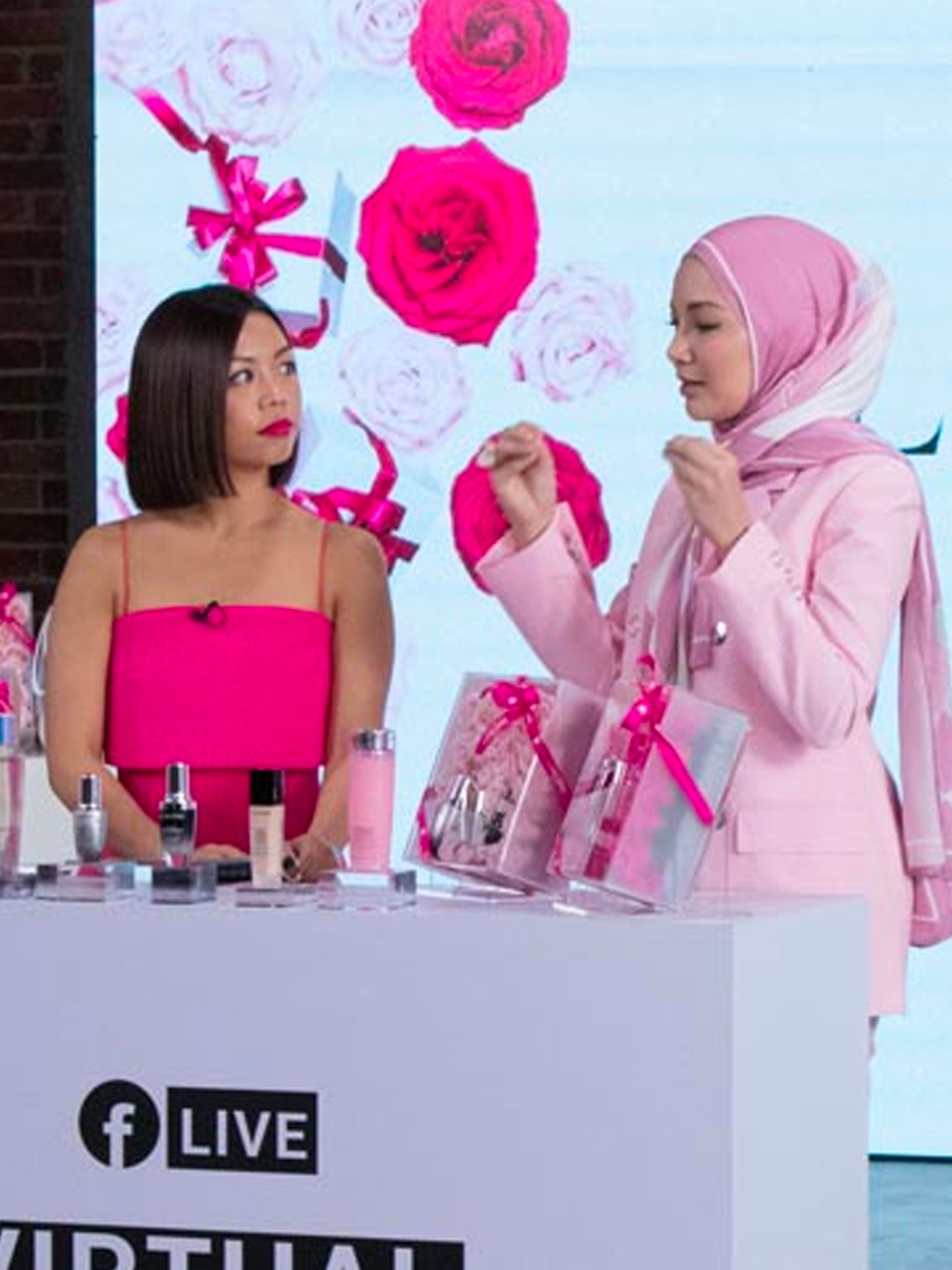 L’Oréal Facebook live - two women standing at Facebook live counter
