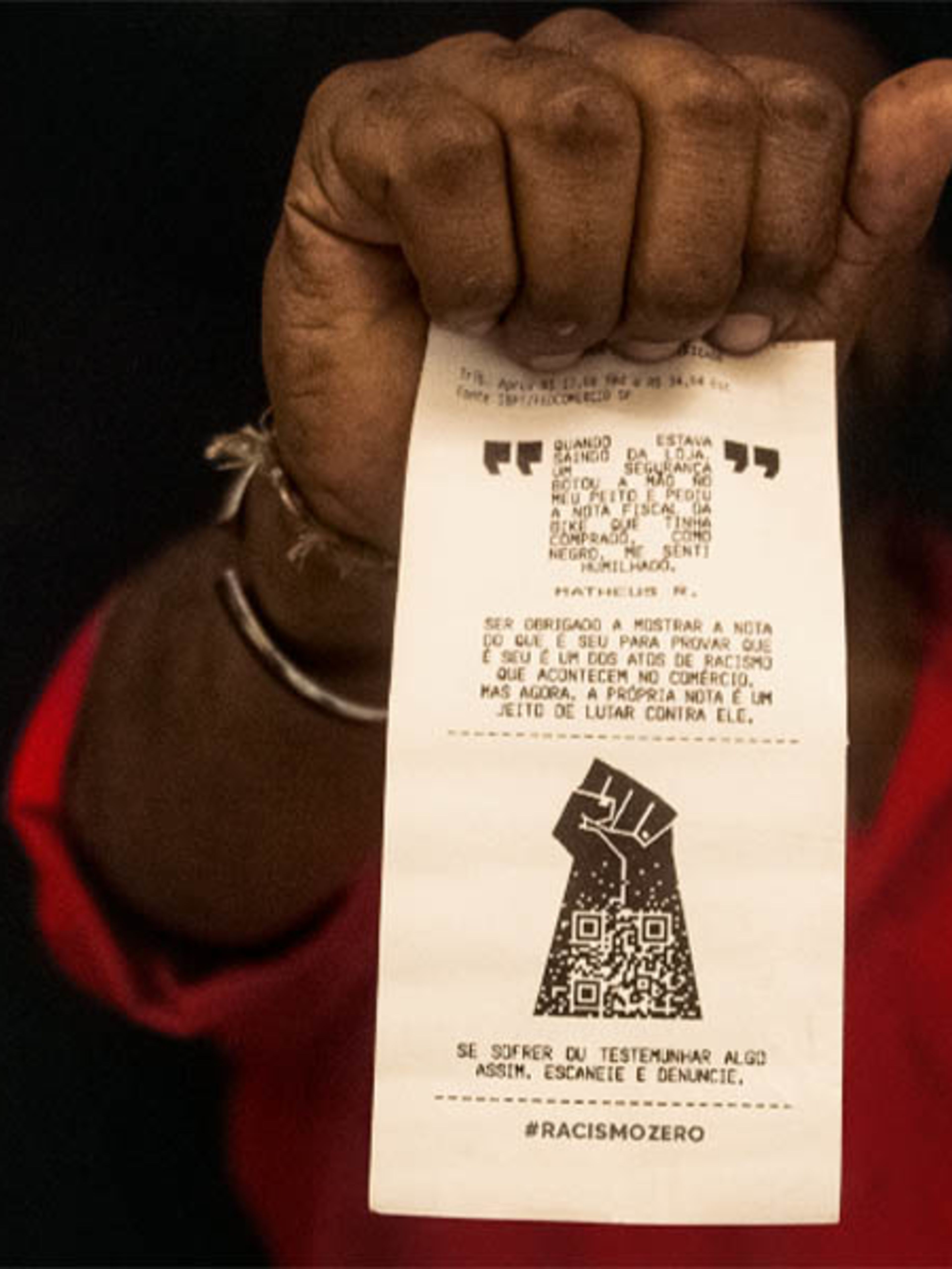 Hand holding up Receipt