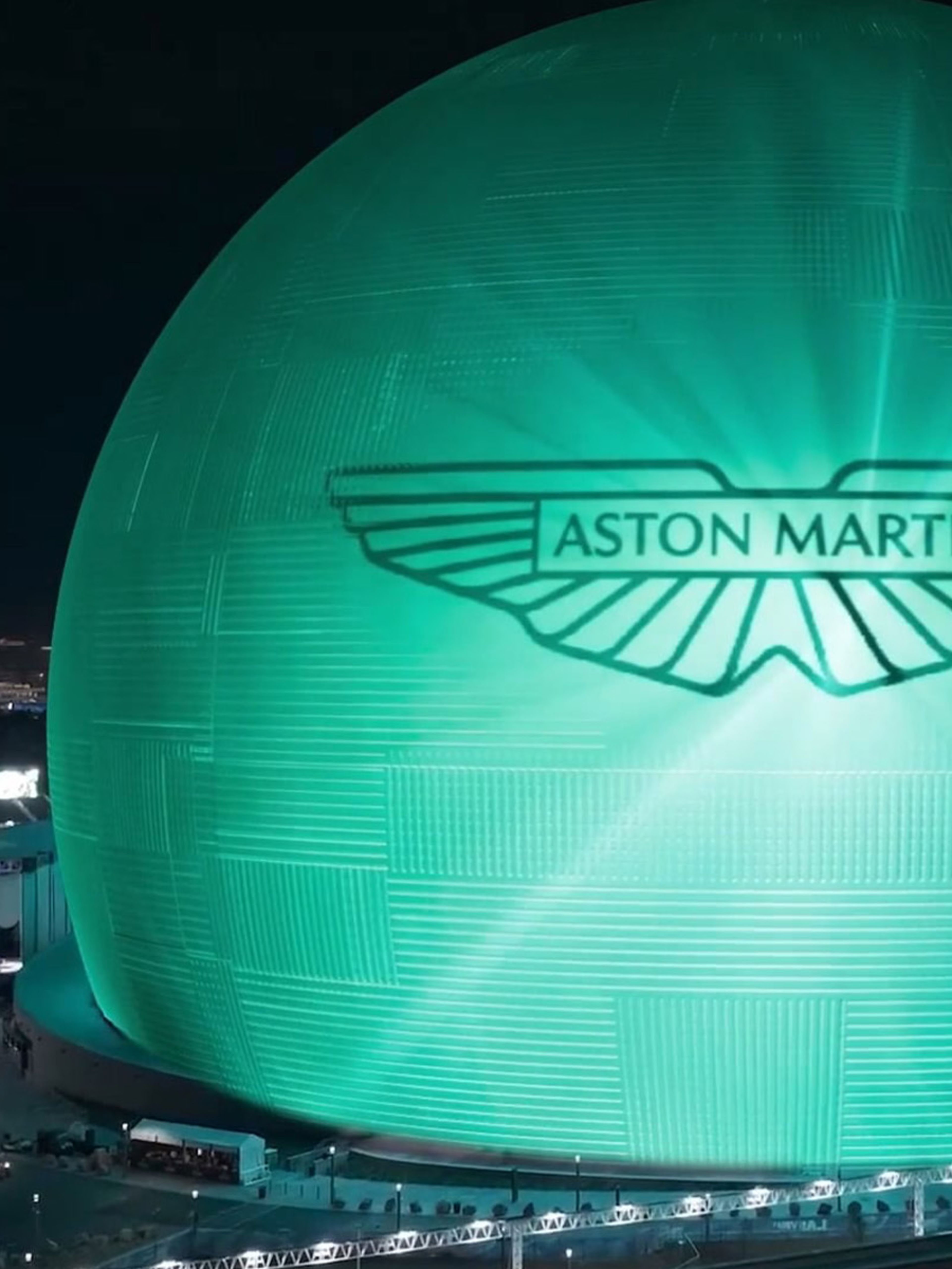 The Las Vegas Sphere coloured in green with the Aston Martin logo on it