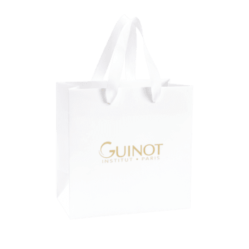 Guinot MATERIELL Papirpose hvit med gull-logo