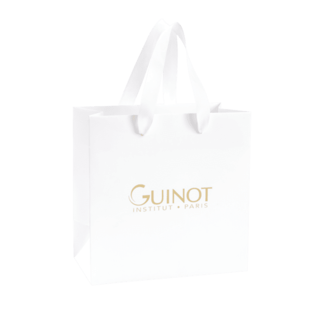 Guinot MATERIELL Papirpose hvit med gull-logo