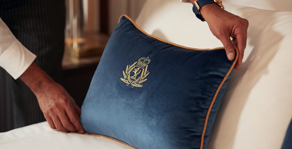 Cunard cushion on bed