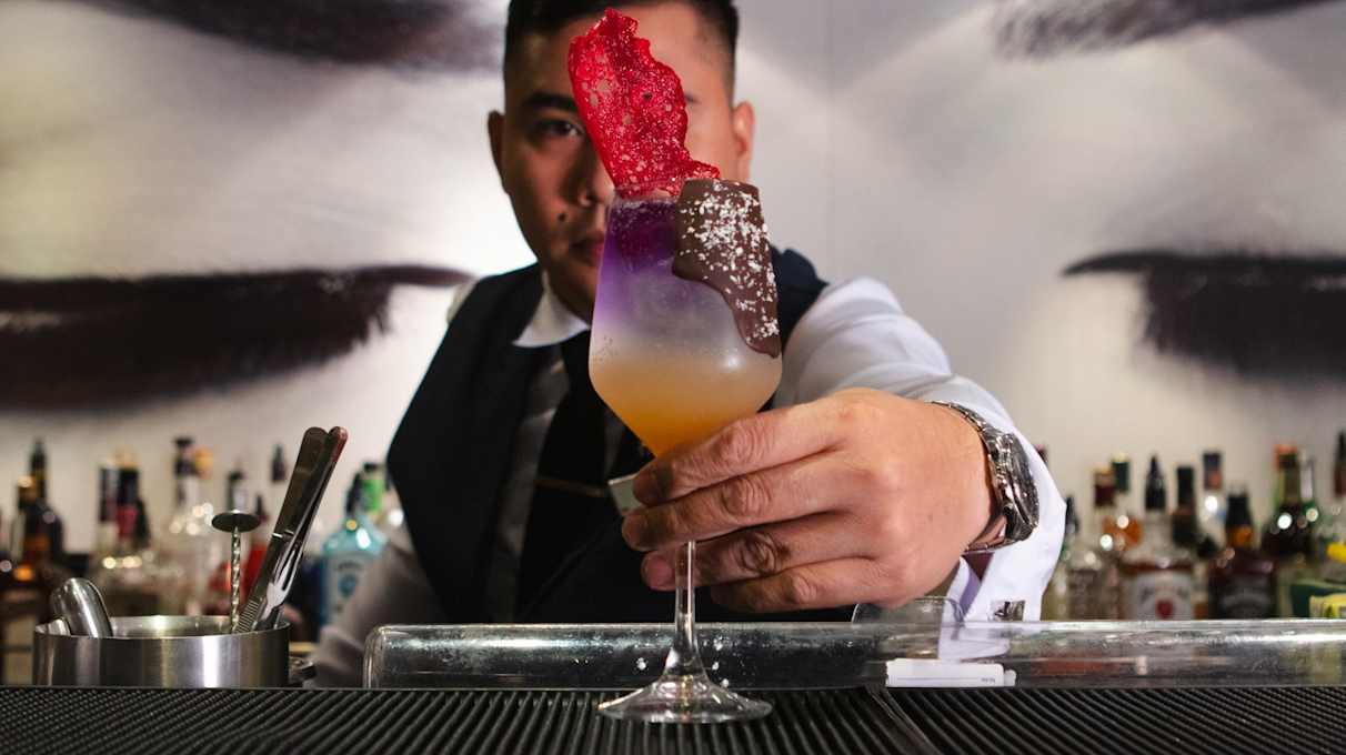 A fun cocktail being served on a Celestyal Cruises ship
