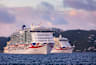 As the sun sets, P&O Cruises two largest ships, Excel class Arvia and Iona depart from Tortola, British Virgin Islands, yesterday,