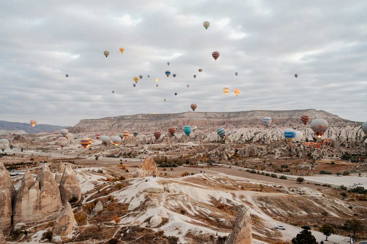 View of Goreme with hot air balloons