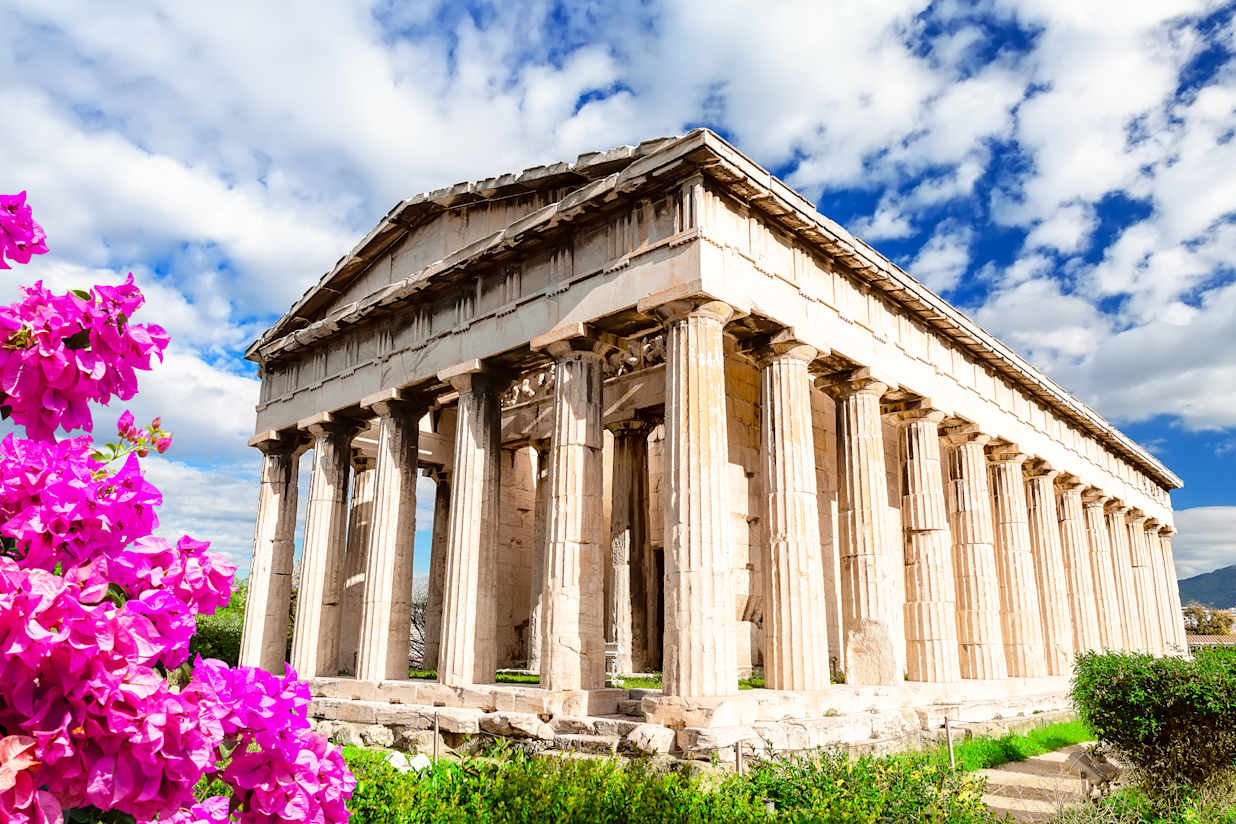 Temple of Hephaestus in Athens, Greece. Sunny view of Ancient Greek ruins in the Athens center. The Famous Hephaestus temple on the Agora in Athens, the capital of Greece.