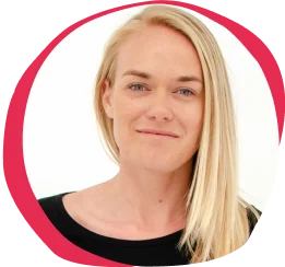 portrait of a woman with blonde hair smiling against a light background, professional headshot with a vibrant pink border