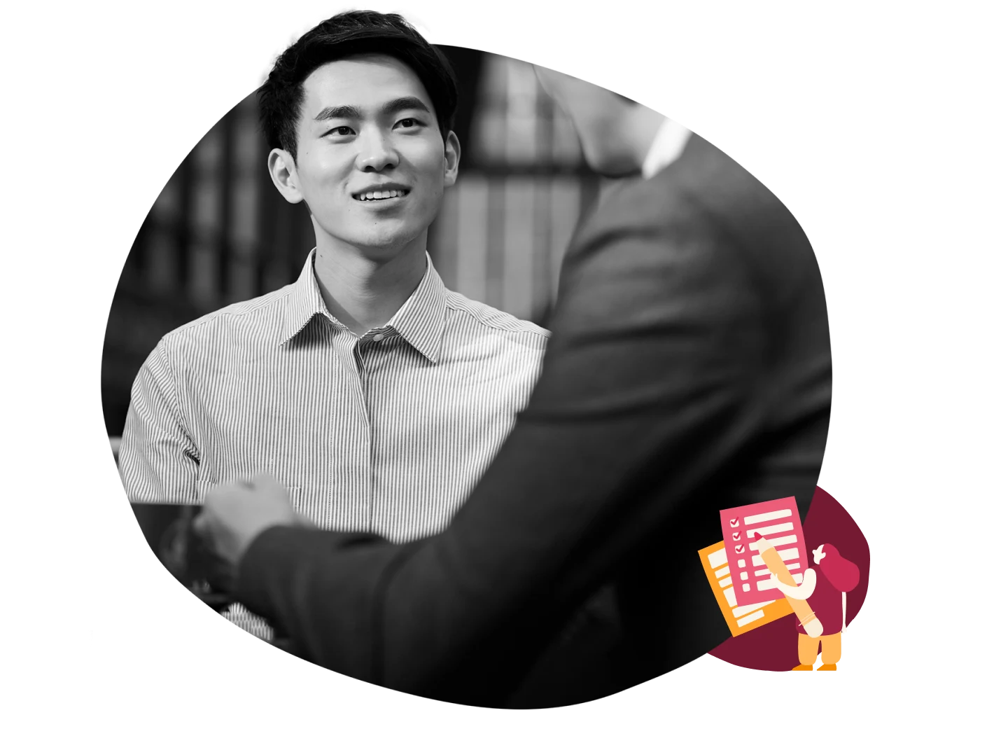 young man in striped shirt smiling during conversation, business context with documents icon, conversation in a modern office setting