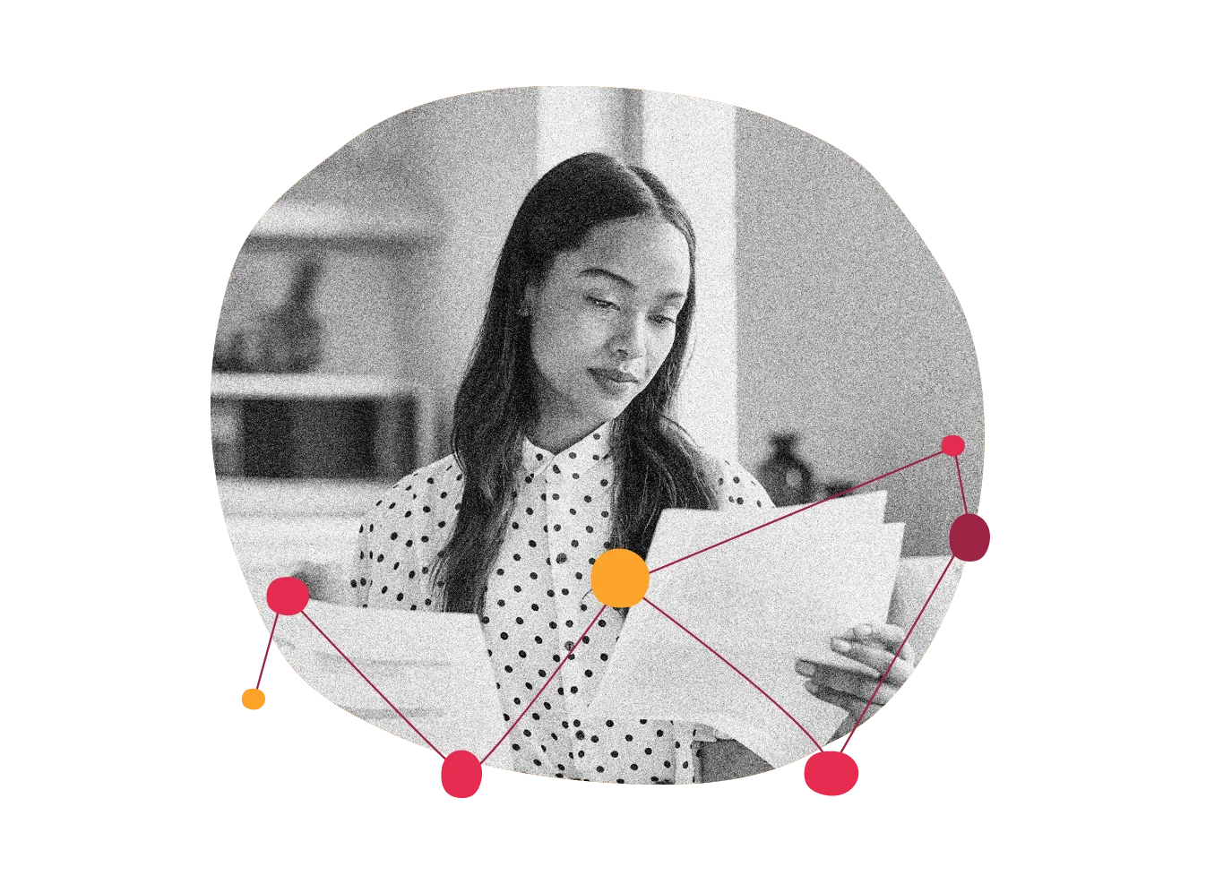 woman reviewing documents, black and white image with colorful abstract connections and polka dot shirt