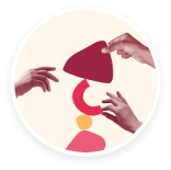 hands arranging colorful shapes, abstract art with red, yellow, and pink elements in a circular composition
