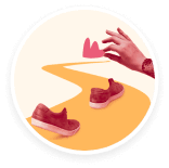 shoes_on_path, hand_placing_heart