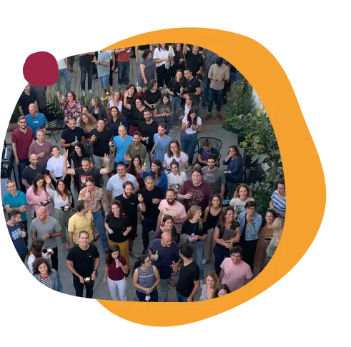 crowd of people gathered outdoors for an event, diverse group enjoying a social gathering in an urban setting