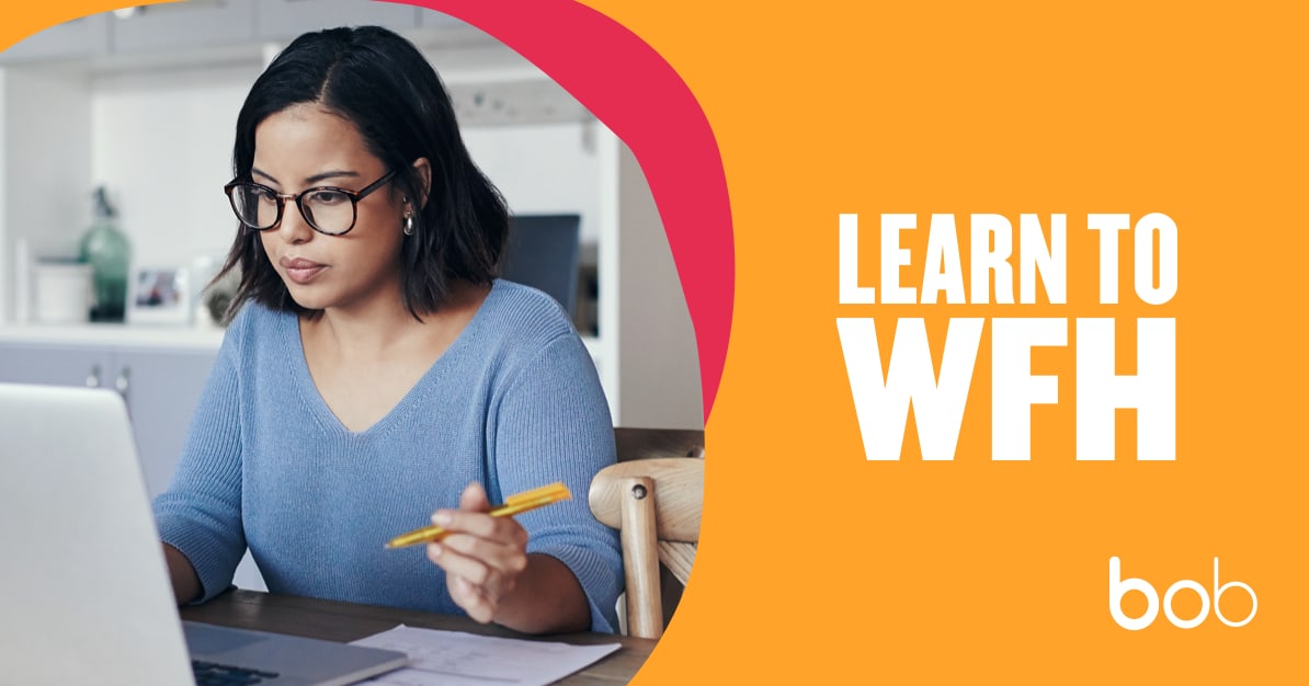 focused-young-woman-working-on-laptop, work-from-home-tips-remote-working-guide