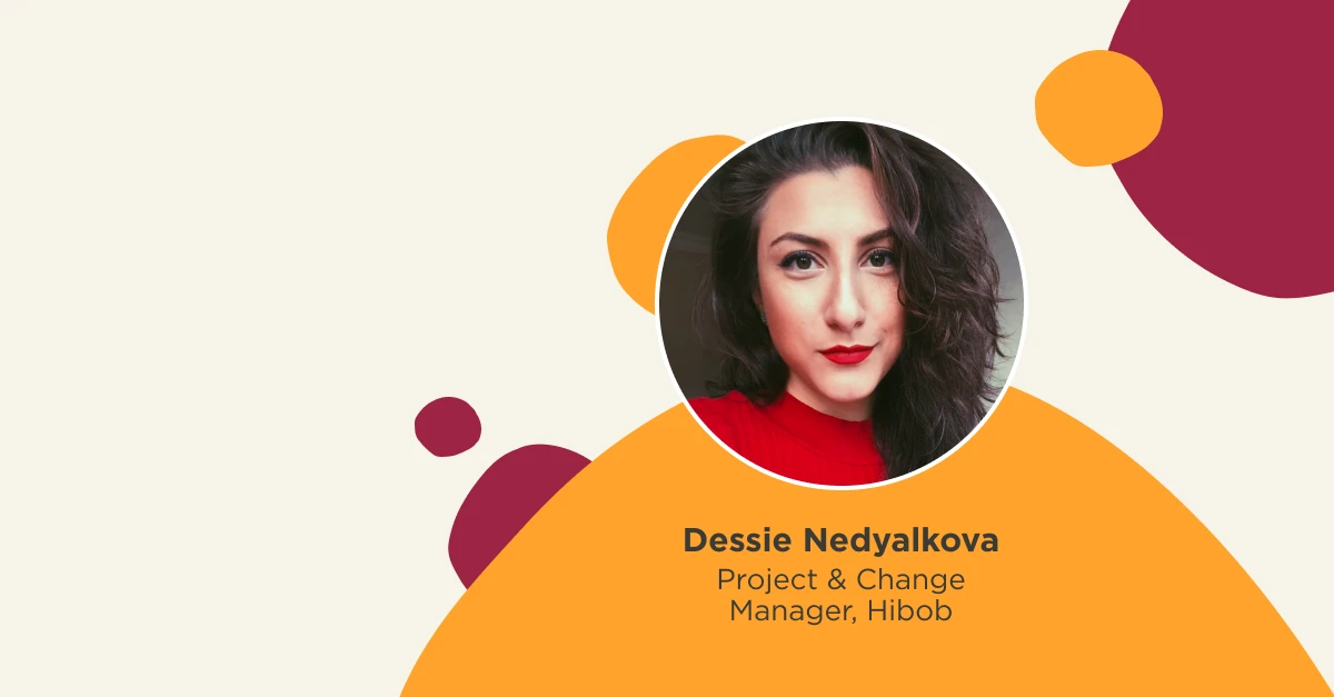 portrait of Dessie Nedyalkova in red shirt, Project & Change Manager at Hibob with abstract colorful background