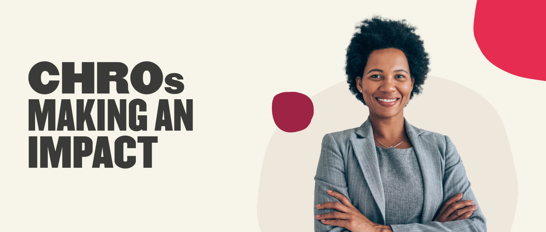 CHROs making an impact, smiling woman in gray suit with curly hair on a light background, professional leadership and empowerment