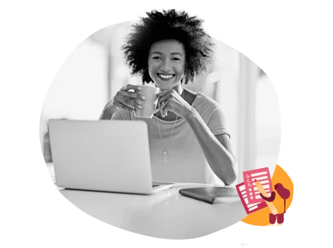 smiling-woman-holding-cup-working-on-laptop, modern-workspace-cozy-atmosphere
