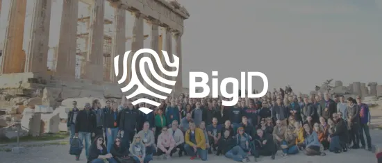 ancient ruins and group photo of BigID employees at historical site, bigid team gathering in front of a classical monument