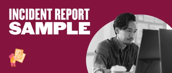 incident report sample, man working on computer in a professional setting with focus on incident documentation
