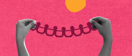 hands holding cut-out paper figures against a vibrant pink textured background with a sun graphic, creative representation of unity and connection