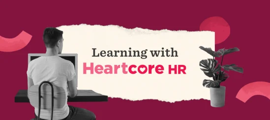 Learning with Heartcore HR, featuring a person at a computer and a decorative plant in a modern workspace. , learning, workspace