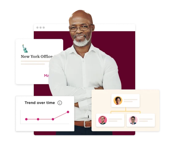 man in white shirt smiling with graphs and organizational chart, New York office background, diverse professional representation