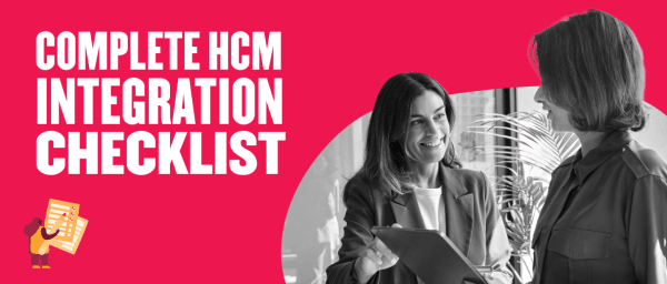 HCM integration checklist with two women discussing in an office, emphasizing collaboration and planning., HCM, integration