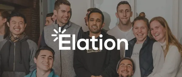 happy diverse group of people smiling together with Elation logo in foreground, team collaboration in a welcoming environment