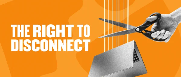 right to disconnect, hand cutting laptop cord with scissors on orange background