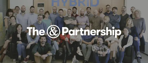 team photo, The & Partnership branding